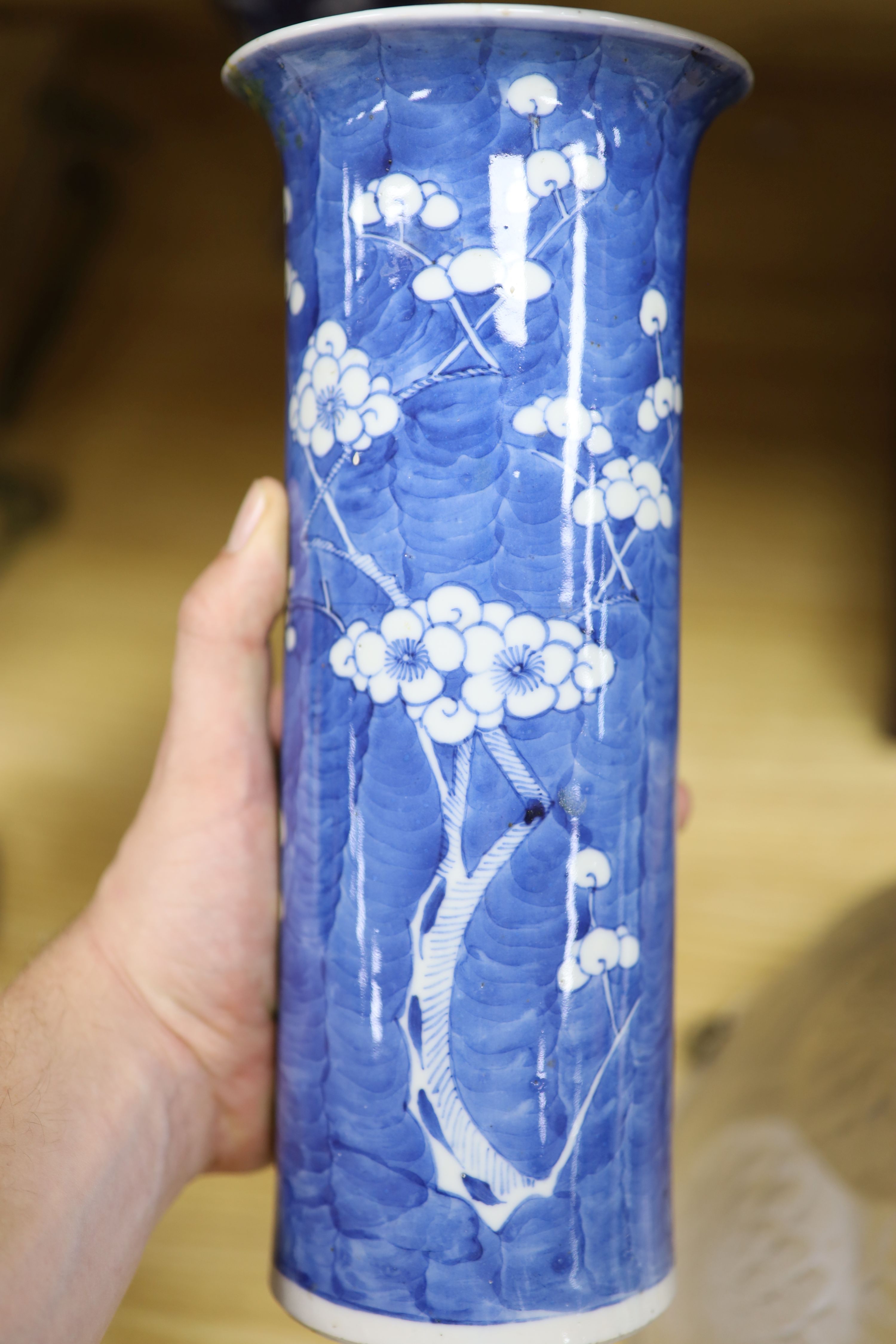 A Chinese blue and white cylindrical vase, another vase and cover and a blue and white jar and cover, together with a cloisonne vase and a bronze censer, tallest 32cm